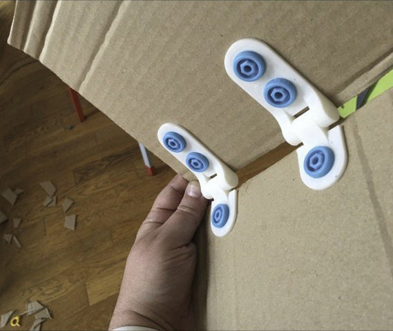 Makedo 3D Printed Hinges for cardboard construction assembled