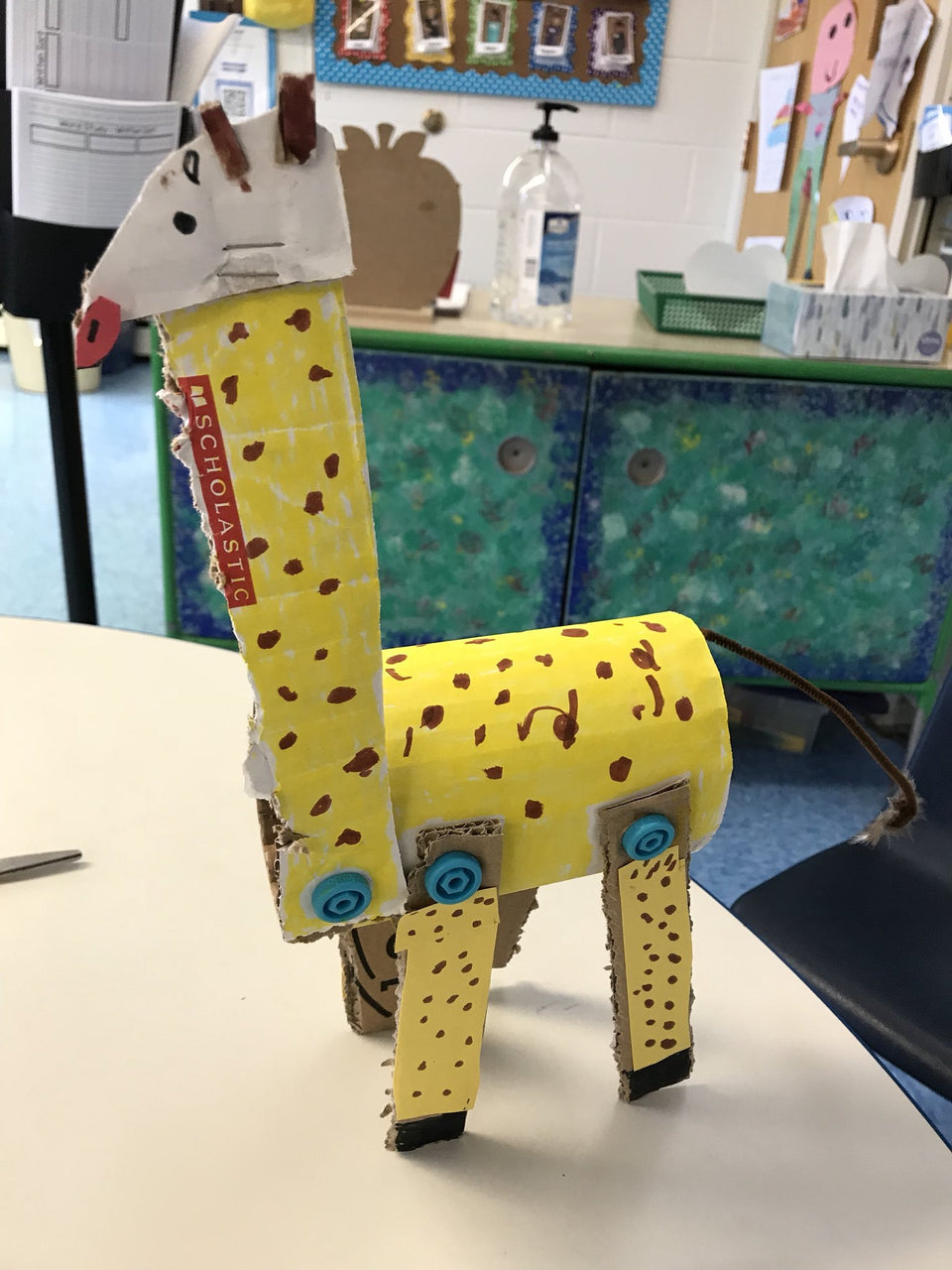 Cardboard giraffe made with Makedo construction system