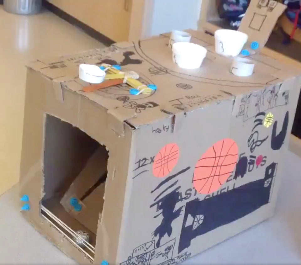 Cardboard arcade ball toss game Makedo cardboard challenge