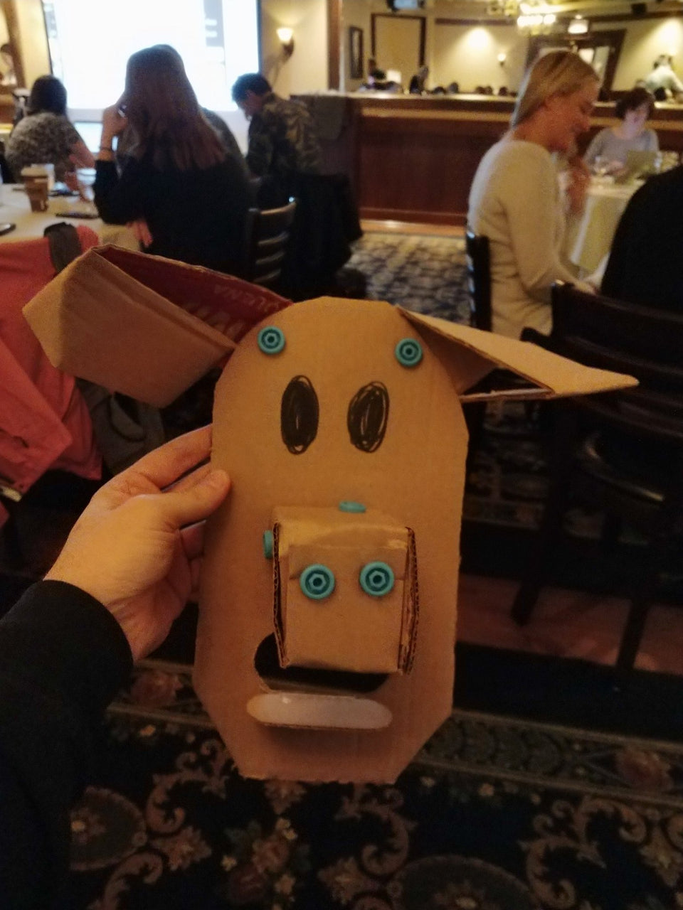 Makedo cardboard pig mask that started as a dog