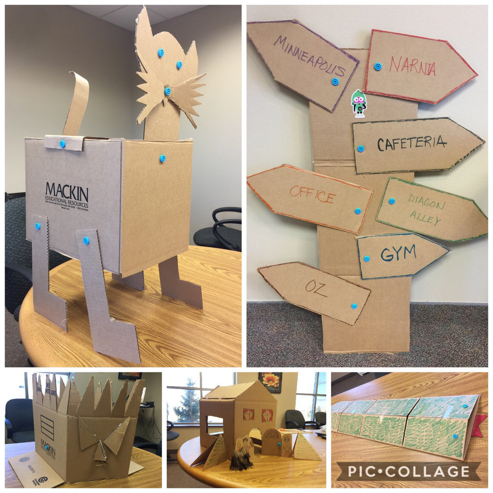 Cardboard cat, snake, creatures and signpost made with Makedo construction system.