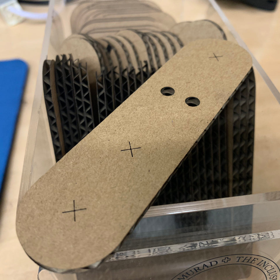 Makedo laser cut cardboard hinge strap for the Makedo construction system