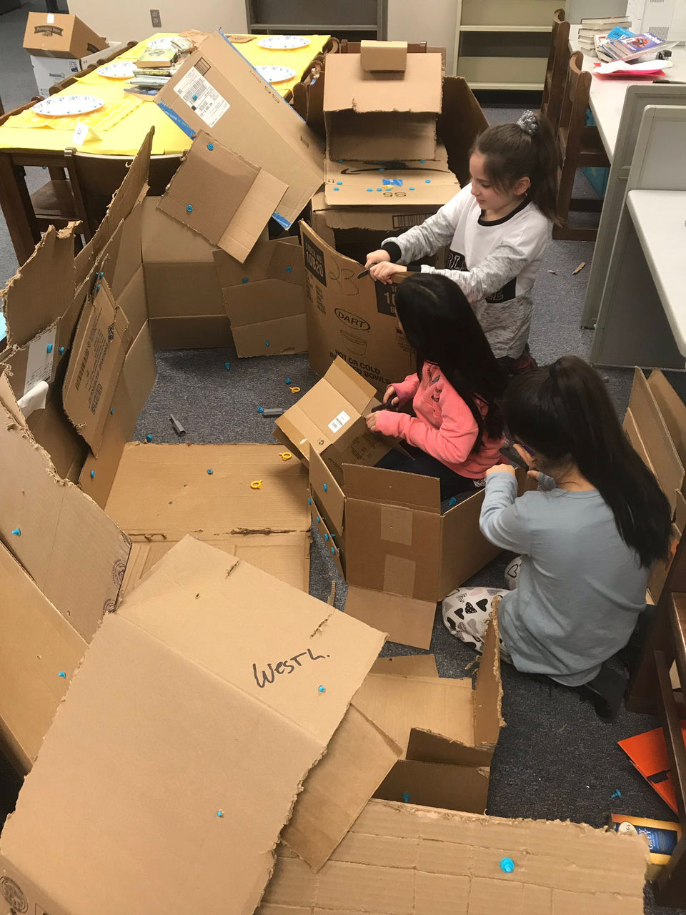 Construction in progress with Makedo cardboard tools