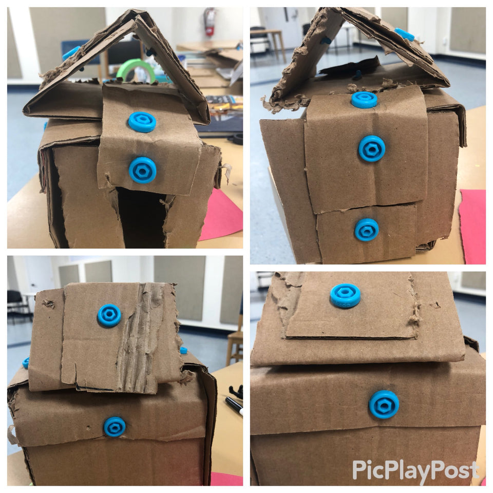 Mini cardboard house made with Makedo cardboard construction system
