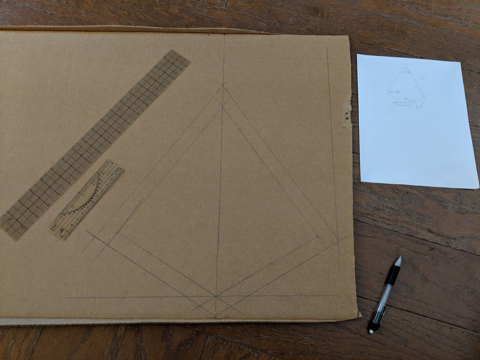Mapping out parts for the cardboard geo dome to build with Makedo construction tools