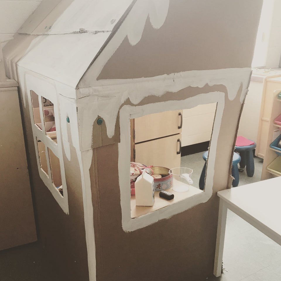 Cardboard gingerbread playhouse built using the Makedo cardboard construction system